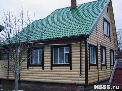 Наружная обшивка старого дома профлистом, сайдингом фото 1