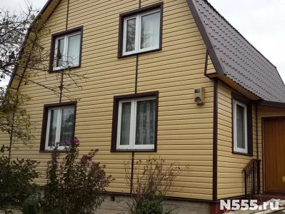 Наружная обшивка старого дома профлистом, сайдингом фото 2